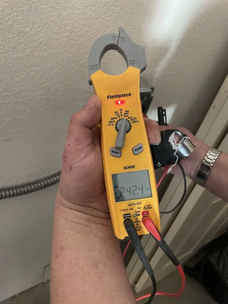 Voltage testing with clamp meter during Aluminum Wiring Replacement in North Ridgeville